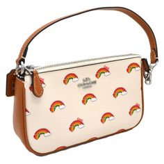 Brand New With Tags. Features 2 Interior Credit Card Slots And An Interior Multifunction Pocket. Has The Signature Coach Horse And Cart Logo. Approximately 7 1/2" (L) X 4 1/2" (H) X 2" (W). Top Handle With A 6 1/4" Drop. Coach Multicolor Clutch Bag, Multicolor Coach Clutch Bag, Multicolor On-the-go Wallets, Cart Logo, Nolita 19, Small Leather Purse, Pride Collection, Leather Purse, Coach Bags