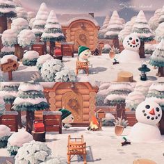 a snowman is standing in the middle of a snowy village