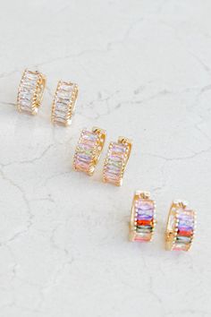 DETAILS  pack of three gold hoop earrings textured and embellished design clasp back close material - copper / zircon           LENGTH  length - 1.2" Preppy Earrings, Preppy Accessories, Everyday Glam, Jewelry Essentials