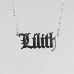 Lilith Necklace ☾ Necklace is solid .925 sterling silver & measures approx 1 in. wide x less than half an inch tall. Chain measures 16" long but can be made shorter//longer upon request (leave a note at checkout with your desired chain length). If pairing with another nameplate necklace from the collection, it is recommended to go with an 18" chain so they don't overlap. ❋ ❋ This item is hand crafted for each order and requires approx 2-4 weeks for production and shipment. If you have a dead Lilith Name, Lilith Necklace, Lillith Goddess, Lilith Goddess, Goddess Lilith, Witchy Jewelry, Nameplate Necklace, How To Make Shorts, Girly Jewelry