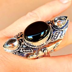 Brand New Handmade Overzized Ethnic Black Onyx And White Topaz Silver Statement Ring. Size 8.75 925 Stamped New To Poshmark? Use Referral Code Kimberlyn222 To Receive $10. Bohemian Sterling Silver Jewelry With Accent Stones, Black Oval Jewelry With Gemstone Accents, Black Oval Gemstone Accent Jewelry, Black Rings With Gemstone Accents As Gift, Black Rings With Gemstone Accents For Gift, Artisan Black Sterling Silver Rings, Black Bohemian Rings With Gemstone, Black Jewelry With Gemstone Accents For Gift, Artisan Black Round Ring