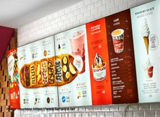 the menu for an ice cream shop is displayed on the wall above the counter top