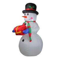 an inflatable snowman is holding a red bag and wearing a black hat