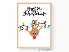 a christmas card with a reindeer's hand and lights hanging from the string on it