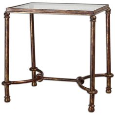 a glass top end table with metal legs