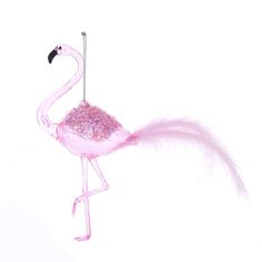 a pink flamingo ornament hanging from a chain on a white background,