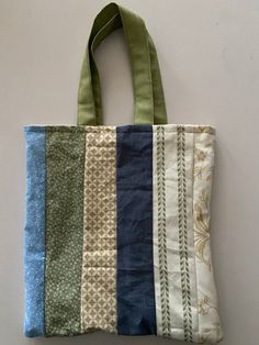 These handmade totes are perfect for on the go! This is one of a kind made with many different fabrics! Scrappy Tote Bags, Handmade Tote, Different Fabrics, The Go, Tote Bag, Purses And Bags, Fabric