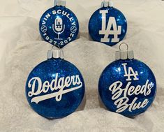 three dodgers ornament ornaments on white paper