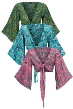 Silky bell sleeves wrap top 70% silk 30% polyester, beautifully printed soft and floaty fabric, long bell sleeves, tie front, can be tied on the front or side or back Small - chest up to 36 inches, length 15 inches, approx UK fit up to 12 Large - chest up to 42 inches, length 16 inches, approx UK fit up to 18 US Size rule: Minus 2 sizes to get your US size (for example, a UK dress size 8 is a US dress size 4)  ❤  More clothing styles available at WWW.WICKEDDRAGON.CO.UK  ❤ ❤ You can find us on other platforms for more content, photos, updates, new stock alerts and behind the scene moments ❤ Website: www.wickeddragon.co.uk Facebook: www.facebook.com/wickeddragonclothing Instagram: www.instagram.com/wickeddragonuk TikTok: www.tiktok.com/@wickeddragonuk Check out our shop on ETSY www.wickeddra Fitted Bohemian Wrap Top, Wrap Crop Top Pattern, Wrap Top Bell Sleeve, Wrap Tops For Women, Tops Designs For Jeans, Wrap Top Outfit, V-neck Printed Kimono For Festivals, Boho Print V-neck Kimono For Festivals, Content Photos