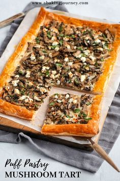 puff pastry mushroom tart on a cutting board