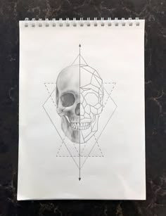 a drawing of a skull on top of a marble table with lines in the middle