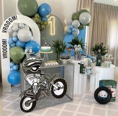 a motorcycle themed birthday party with balloons and decorations