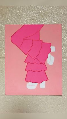 a paper cut out of a woman in a pink dress