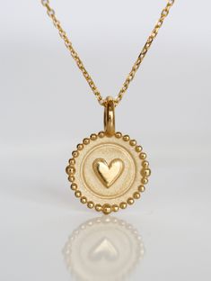 ~~ Charming Heart Charm Necklace ~~ A symbol of love, the heart charm is a piece of enduring fine jewelry to wear everyday, forever. Choose your favorite charm, or build a charm necklace. With fine feminine details, your charms bring love and happiness wherever she goes. The fine collection is designed and created as an heirloom to treasure - elegant, meaningful, and all around spectacular. Fine 14k Gold Proudly Crafted Entirely in the USA. ~~ Shop all silver and 14k Gold Charm Collection https: Love Heart Necklace, Gold Charm Necklace Pendants, Gold Heart Pendant Charm Necklace For Gift, Gold Heart Pendant Charms For Gifts, 14k Gold Heart Charm Pendant, Gold-tone Heart Pendant Charm Necklace For Gift, Fine Jewelry Necklace Gold, Gold Heart Jewelry, Yellow Gold Heart Pendant Charm Necklace, Fine Jewelry