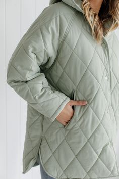 This seasons most wanted jacket - the quilted Finn Jacket is crafted with amazing quality and attention to detail. Available in a soft mint green, this jacket features a large hood, powder coated snap buttons that fasten down the front, deep side pockets, a flattering curved hemline that falls longer at the back for extra coverage. We are completely in love with this quilted design and can not wait for you to try it! Snap buttons fasten down the center of jacket Large hood Quilted design Side po Soft Mint Green, Soft Mint, Coastal Lifestyle, Quilt Jacket, Most Wanted, Ladies Fashion, Online Shopping Clothes, Quilting Designs, Powder Coated