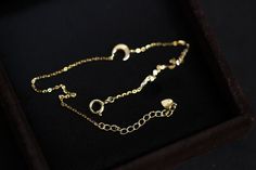 Come with Jewelry bag custom order takes 4-5 weeks to ship  in stock item takes 3-4 days to ship  Size:  moon 6x5.5mm Chain length : 13 cm + 3 cm extension chain 15.5cm + 3 cm extension chain  Material: 14 karat. Only solid gold NO gold filled / NO gold plating.   Gold Info:  24K gold is 100% pure 18K contains 75% gold and 25% alloyed metals 14K is 58% gold and 42% alloyed metals ----------------------------------------------------------------------  quality, simplicity, reasonable price For questions or inquiry please do not hesitate to contact us. We will be happy to assist you.  SHIPPING: 1. Shipping takes approximately 3-5 business days (exclude weekend and holiday) for domestic customer.  Shipping via USPS five days a week Monday to Friday and comes with insurance.  You can track the Elegant Sterling Silver Bracelets With Moon Charm, Minimalist Bracelets With Moon Charm As Gift, Minimalist Bracelet With Moon Charm As Gift, Gold Minimalist Moon Bracelet, Minimalist Gold Moon Bracelet, Dainty Gold Moon Bracelets, Minimalist Moon-shaped Gold Bracelet, Minimalist Moon Shaped Gold Bracelet, Dainty Moon-shaped Gold Bracelets