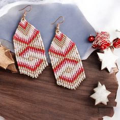 This red and white beaded fringe earrings are made of seed beads, silver plated ear hooks, nylon thread, silicon plugs. All the color fit perfectly and give a mesmerizing look that fits every outfit! Fringe earrings size: The full length of earrings with hook is 3.5 inches approximately. Please contact me if you want these earrings in another size. - Please follow my Esty Page - Follow me on Instagram for updates on new designs and collections @mannat_designco - Follow me on Facebook @MannatDesignCo Festive White Beaded Earrings With Dangling Beads, Festive White Dangling Beaded Earrings, Festive White Beaded Dangling Earrings, Cute Chandelier, Winter Christmas Party, Christmas Party Earrings, Red White Christmas, Beaded Fringe Earrings, Unique Women