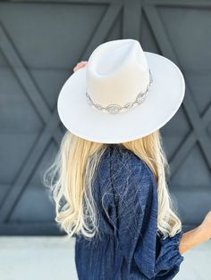 Get ready to turn heads with our Oval Conch Chain Hat. Available in Ivory, Brown, and Black. This uniquely designed hat features an oval-shaped brim adorned with a playful Concho chain. Add a pop of personality to your outfit with this fun and stylish western style hat. 100% Polyester, with an inner adjustable string. Conch Chain, Cozy Chic, Wedge Sneakers, Dressy Tops, Office Fashion, Conch, Sweater Coats, Western Style, Casual Jeans