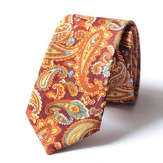 • 2.5" at the widest point• Approximately 58" in Length• Handmade• 100% Cotton• Dry Clean onlyVintage style floral print. This tie is suitable for weddings, proms, casual throw downs, dinner and all special occasions. This tie will certainly start the conversation with lots of compliments. Please note that due to differences in computer monitors, colors may vary slightly from those shown Fitted Paisley Print Suit And Tie Accessories For Wedding, Multicolor Fitted Suit And Tie Accessories For Wedding, Wedding Ties With Paisley Print, Wedding Paisley Print Tie, Wedding Paisley Print Standard Tie, Untied Bow Tie, Men Street Style, Wedding Tie, Floral Bow Tie