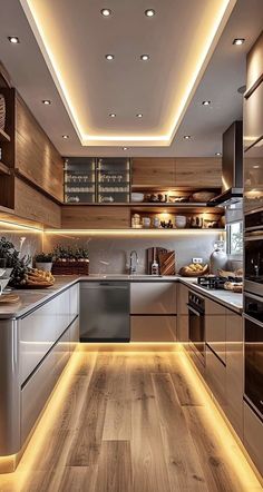 modern kitchen with wood flooring and lighting on the ceiling, along with stainless steel appliances