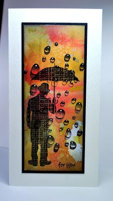 a card with an image of a man holding an umbrella and raindrops on it