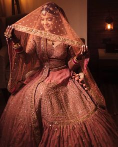 Getting Married In The Night? Here Are The Prettiest Lehenga Colors For You To Try! | WedMeGood भारतीय दुल्हन संबंधी, Bridal Lehenga Collection, Bride Photoshoot, Indian Wedding Photography Poses, Indian Bridal Lehenga, Designer Bridal Lehenga, Bridal Lehenga Red