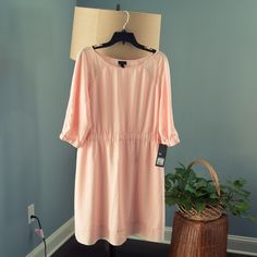 Mossimo 3/4 Sleeve Crepe Dress With Gathered Waist In Peach. Approximate Measurements (Laying Flat): Length (Shoulder Seam To Hem): 37.75” Waist (Seam): 16.5” Bust (Armpit To Armpit): 21” Sleeve Length: 16” Peach V-neck Spring Dress, Peach V-neck Midi Dress For Summer, Blue Asymmetrical Dress, Teal Green Dress, Army Green Dress, Peach Floral Print V-neck Midi Dress, Grey Long Sleeve Dress, Red Sweater Dress, Purple Midi Dress