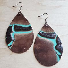 Genuine Leather Teardrop Earring is the perfect complement to your boho or western style. These Teardrops come in two sizes. Large: Length: 2.75" Width: 1.75" Small: Length: 2" Width: 1.25" Although your item will resemble the photo, each piece is created by hand, so no two are identical. Steer Head, Leather Motorcycle Gloves, Leather Store, Leather Denim, Biker Leather, Wing Earrings, Earring Sale, Nice Leather, Turquoise Earrings