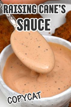 dipping sauce in a white bowl with text reading raising cane's sauce copycat