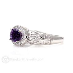 An absolutely gorgeous vintage inspired Amethyst ring ring in your choice of 14K or 18K White, Yellow or Rose Gold. This ring has a .75ct natural Amethyst surrounded by a sparkling diamond halo and diamonds in the leaves of the gorgeous filigree band. It's a beautiful right hand ring or engagement ring. Inquire for the matching wedding band. Amethyst is the birthstone for February. Made to order. Please allow three to four weeks for delivery. ABOUT THIS RING Composition: 14K or 18K Gold Center S Elegant Amethyst Birthstone Diamond Ring, Exquisite Amethyst Jewelry With Center Stone, Elegant Purple Birthstone Ring With Center Stone, Elegant Amethyst Birthstone Ring With Prong Setting, Elegant Purple Diamond Birthstone Ring, Heirloom Amethyst Ring With Center Stone In 14k Gold, Elegant Amethyst Birthstone Ring With Round Stone, Heirloom 14k Gold Amethyst Ring With Center Stone, Elegant Round Amethyst Birthstone Ring