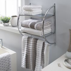 This Organize It All 2 Tier Shelf and Towel Bar adds a modern touch to your bathroom space. The design is sleek and compact but will hold all your bathroom essentials. Hang bath towels or hand towels on the 2 towel bars and put your soaps on the shelf for easy access. This piece mounts to almost any wall surface to create storage and help your organize your space. Organize It All Chrome 2-Tier Metal Wall Mount Bathroom Shelf (17.75-in X 21.5-in X 10.25-in) | NH-1753 Chrome Bathroom Shelves, Bathroom Shelf With Towel Bar, Wall Towel Racks, Mounted Towel Rack, Wall Mounted Towel Rack, Metal Bathroom, Chrome Bathroom, Towel Bars, Mounted Shelves