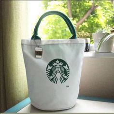 New Starbucks Tote Bags ,Measures 11x11.5inch Canvas Material With Plastic Linings Great Quality,Well Made Colorwhite Large Capacity Bucket Canvas Bag For Errands, Large Capacity Canvas Bucket Bag For Errands, White Bucket Box Bag For Daily Use, White Bucket Box Bag For Travel, Daily Use Canvas Bucket Bag, White Rectangular Lunch Bag, White Bucket Canvas Bag With Removable Pouch, White Bucket Box Bag, White Bucket Bag As A Gift