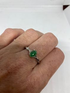 Vintage green nephrite jade Ornate German Silver ring, does not tarnish, NOT sterling Sizes 6.75, 7.75, or 8 All rings are shipped in a nice gift box. Check out our over a THOUSAND great reviews Engraving is $4 per letter and is not always perfect depending on the piece. It can take a few days if the jeweler is busy. This is payable to Paypal Judithsltd@gmail.com Green Jade Promise Ring, Green Jade Ring As A Gift, Green Jade Rings For Promise, Green Jade Ring Suitable For Gift, Green Jade Jewelry For Promise Ring, Green Jade Ring For Gift, Green Opal Ring For May Birthstone Gift, Jade Ring For Anniversary, May Birthstone, Green Oval Opal Ring For Promise