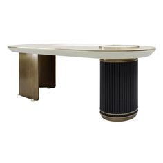 a white table with two black and gold pedestals