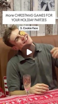 a man sitting at a table with a cookie on his face in front of him and the words more christmas games for your holiday parties