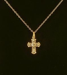 "- Awesome Antique Gold Mexican Talavera Cross Pendant, Necklace, in Gold Plated Pewter with 14K Gold Filled Oval Cable Chain. See Photos #1-3. - Gold Plated Copper Pinch Bail with flair ends. - Cross measures 1 x 3/4\" and drops 1 1/2\" from the Chain. Cross is reversible and has the different but equally pretty look on the back side. See Photo #4. - Chain Length 20\". - 14K Gold Filled Oval Cable Chain. - Closure is with a 14K Gold Plated Pewter Hook & Eye Clasp. See Photo #5. - Give us a Classic Gold Nickel-free Necklace, Victorian Gold Necklaces With Hallmark, Ornate Gold Cross Pendant Necklace, Antique Gold Cross Pendant Necklace, Antique Gold Cross Pendant Jewelry, Gold Filigree Cross Pendant Necklace, Gold Filigree Cross Necklace, Gold Cross Necklace With Filigree, Gold Filigree Cross Jewelry