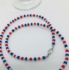 "This beadwork project is a design that is made on Accuflex beading wire. This necklace measures 22\".  If you would like this necklace done in a different size or colors, let me know and I'll set up a listing for that.  You are purchasing this actual beaded necklace. These are great layered with your other necklaces.  Let me personalize some especially for you in your school colors. This could be the colors of your High School." Red Patriotic Necklace For 4th Of July, Adjustable Blue Patriotic Necklace, Patriotic Round Beads Necklace As Gift, Patriotic Blue Beaded Necklaces, Blue Beaded Necklaces For 4th Of July, Patriotic Round Beads Necklace Gift, Adjustable Patriotic Red Necklace, Blue Beaded Necklace For 4th Of July, Patriotic Blue Beaded Necklace