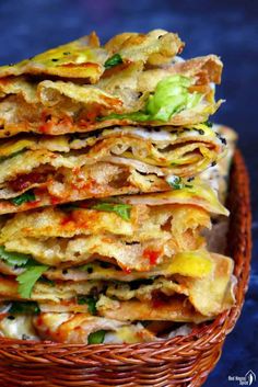 a basket filled with lots of food on top of a table