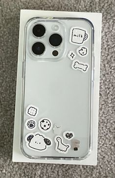 an iphone case with some stickers on it