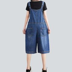 Introducing the 2023 Summer Collection ââ‚?denim romper with uneven buttons. 90s style! This established piece of punkish vogue is perfect for the trendsetter who loves to make a statement and stand out from the crowd.Why They're Your Next Summer StapleThese denim-inspired shorts are the perfect blend of contemporary vogue and nostalgic 90s underground. With a unique asymmetric button and zipper closure. they flaunt a damaged pattern that adds a hint of edginess to any look. Crafted with premium Trendy Bib Front Shortalls With Pockets, Casual Summer Shortalls With Pockets, Denim Blue Bib Front Jumpsuit For Spring, Denim Blue Bib Front Jumpsuits And Rompers For Spring, Spring Cotton Overalls In Solid Color, Trendy Bib Front Shortalls, Trendy Summer Bib Front Shortalls, Trendy Summer Shortalls With Bib Front, Trendy Bib Front Overalls For Spring