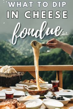 what to dip in cheese fondue on a table with breads and wine glasses