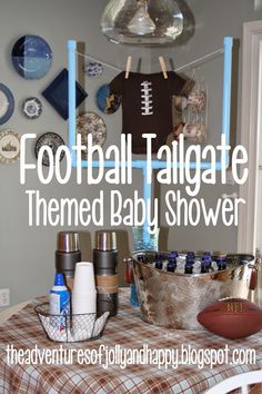 a football themed baby shower is shown with items on the table in front of it