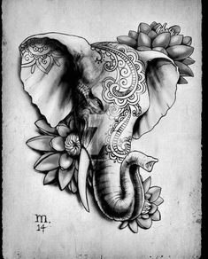 an elephant with flowers on it's back