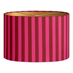 a pink and red lamp shade on a white background