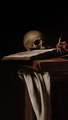 a painting of a skull sitting on top of a table next to an open book