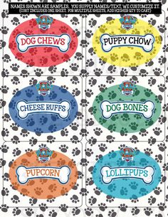 four different labels for dogs and puppies with paw prints on them, all in various colors