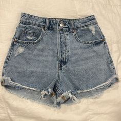 Women’s Denim Shorts From H&M Size: 2 Color: Washed Blue Denim; Distressed Brand: H&M Button Fly. 5 Pockets. Short, Raw Edge. High-Waisted. Never Worn. H&m High Rise Dark Wash Jeans, H&m High-rise Dark Wash Jeans, H&m Dark Wash Denim Jeans, H&m High Waist Jeans With Pockets, H&m Medium Wash Denim Jeans, H&m Denim Blue Jeans, H&m High Waist Jeans, Trendy H&m Dark Wash Jeans, H&m Light Wash Straight Leg Bottoms