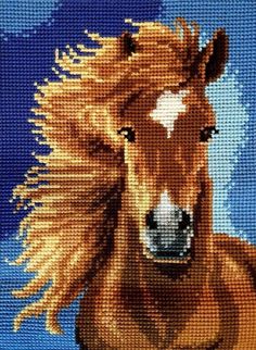 a cross stitch picture of a brown horse with long hair on it's head