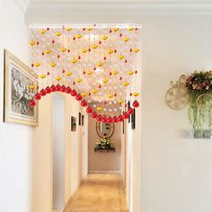 the hallway is decorated with red and yellow beads