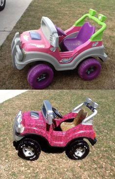 two toy cars sitting on top of grass next to each other in the same color